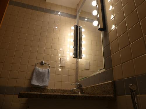 A bathroom at Studio Apartment - Cozy, Very Accessible and so near to Train Station