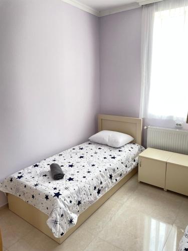 Un pat sau paturi într-o cameră la LaoVardi Hostel