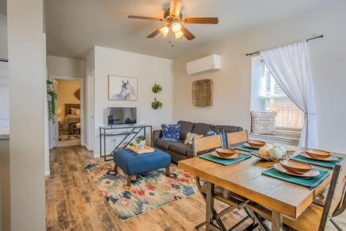 a living room with a table and a couch at 2 BDS Garden Of Gods - Near it all in Colorado Springs