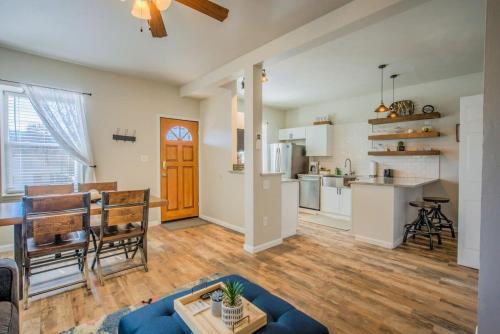 a living room with a kitchen and a dining room at 2 BDS Garden Of Gods - Near it all in Colorado Springs