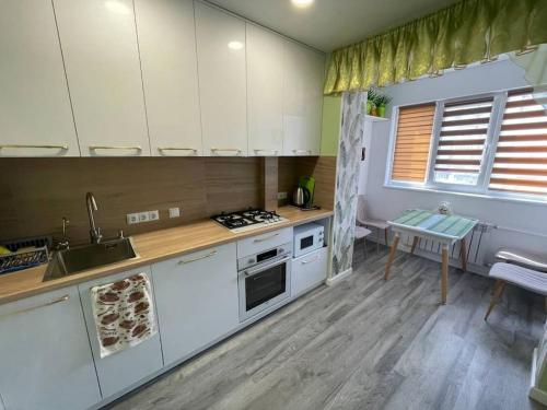 Dapur atau dapur kecil di Central Râșcani Apartment