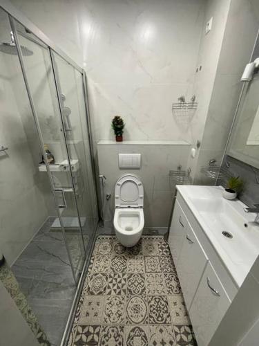 Bilik mandi di Central Râșcani Apartment
