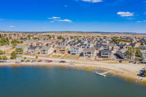 an aerial view of a beach with houses at Luxury Lake House With Mountain Views & Hot Tub in Monument