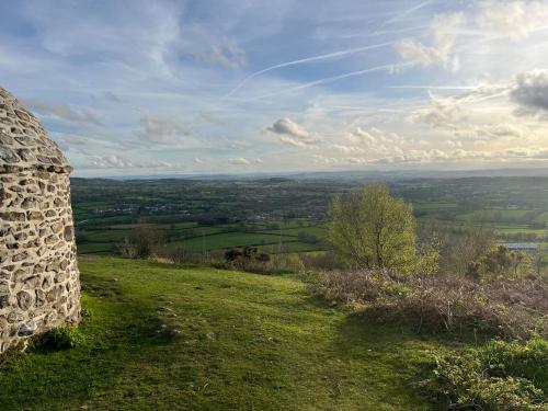 a view of a field from the top of a hill at Piglet Corner in Culmstock