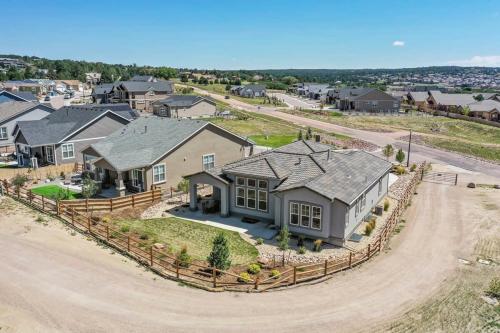 an aerial view of a house with a driveway at 4BR Mountain views - Movie Theater - Pool Table in Monument