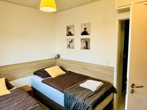 Cama o camas de una habitación en MILA-Appartement