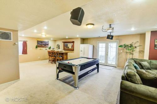 a living room with a pool table in it at *H* 5BR Home Getaway w/HOT TUB ** in Pikeview
