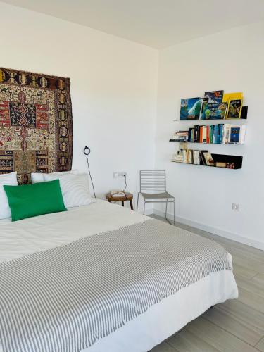 A bed or beds in a room at CASA MIRABEL