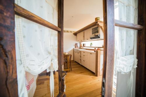 a view of a kitchen from a room at B&B Ca' La Vedescia in Teglio