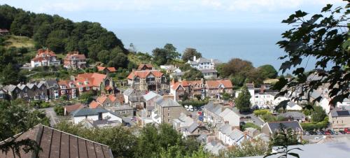 a small town on a hill with houses at Rockvale House in Lynton