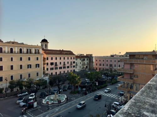 a view of a city street with cars and buildings at La Fontana Luxury Apartment in Nettuno