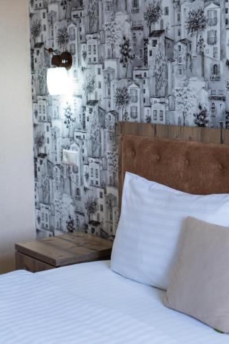 Кровать или кровати в номере TOURIST INN hotel