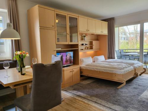 Postel nebo postele na pokoji v ubytování Apartment 74 im Haus Villa Anna II