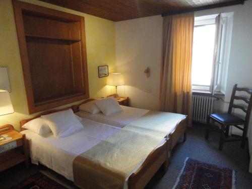 Кровать или кровати в номере Ristorante Stazione