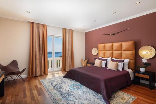 Postel nebo postele na pokoji v ubytování La Villa Dubrovnik