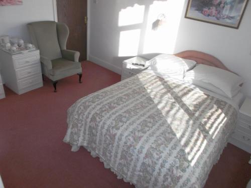 Ένα ή περισσότερα κρεβάτια σε δωμάτιο στο Tanamara Guest House