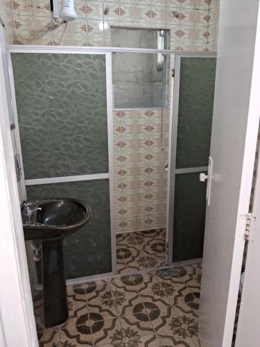 Et badeværelse på Casa espaçosa em Belo Horizonte