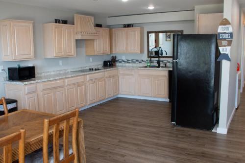 Η κουζίνα ή μικρή κουζίνα στο Cozy Home Lake Huron II