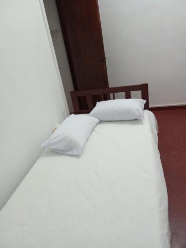 Cama o camas de una habitación en Colombo City Traveler