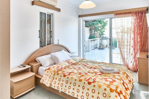 A bed or beds in a room at The Mardim Villa