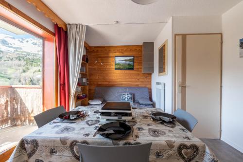 Ένα ή περισσότερα κρεβάτια σε δωμάτιο στο Appartement St François Longchamp