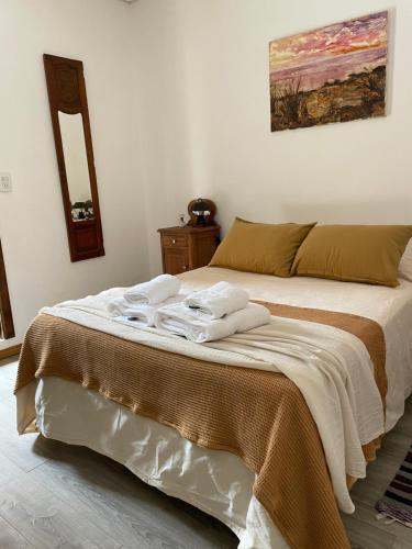 Ένα ή περισσότερα κρεβάτια σε δωμάτιο στο La Escondida, Casa de Huéspedes