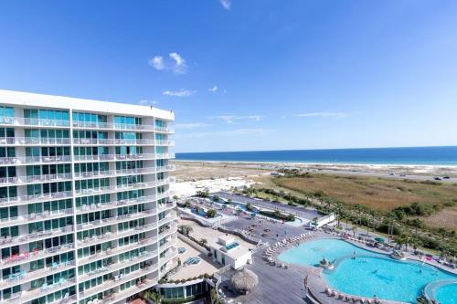 an aerial view of a hotel and the beach at Caribe Resort Unit C1108 in Orange Beach