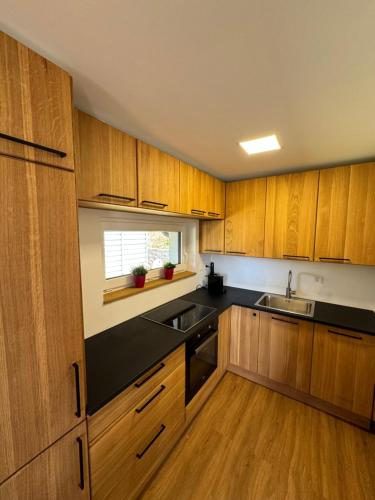 Kuchyň nebo kuchyňský kout v ubytování Špan Cottage