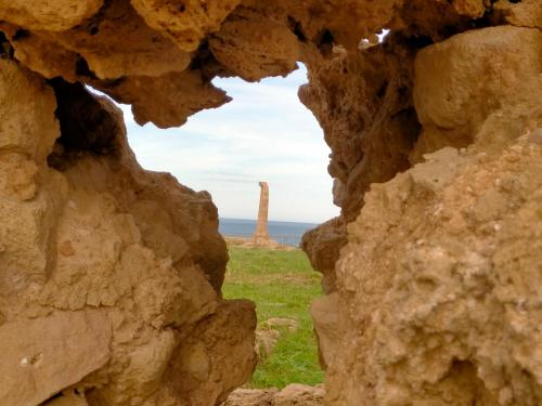a view from a cave in a rock formation at Re Mare B&B in Crotone
