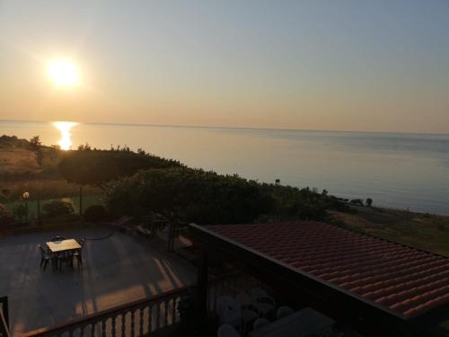 a view of the sun setting over the water at Re Mare B&B in Crotone