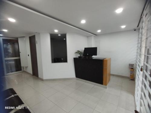 Ο χώρος του λόμπι ή της ρεσεψιόν στο Magnifico y Confortable Apartamento Amoblado
