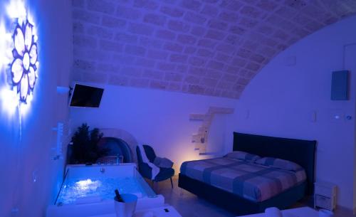 Una cama o camas en una habitación de Suite al 10