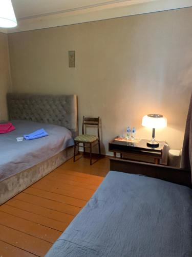 Postel nebo postele na pokoji v ubytování Villa Bubi