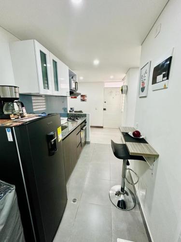 Η κουζίνα ή μικρή κουζίνα στο Magnifico y Confortable Apartamento Amoblado