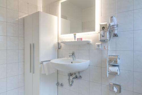 Bilik mandi di Ferienzentrum Wenningstedt
