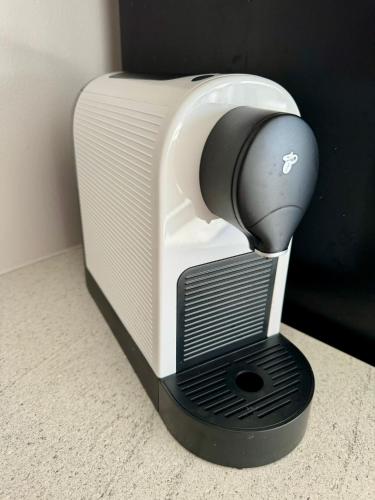 a toaster sitting on top of a counter at Byt apartman 2rooms 76m2 all new in Prague