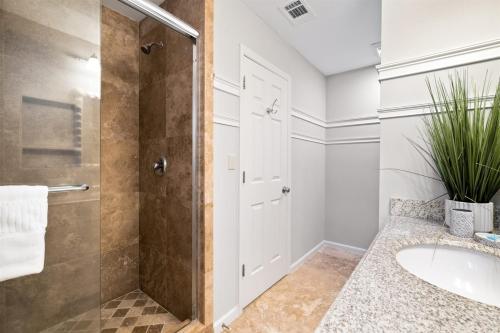 a bathroom with a shower and a sink at Beachwalk 158 in Hilton Head Island