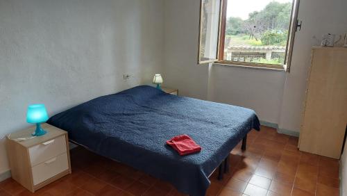 Krevet ili kreveti u jedinici u okviru objekta Appartamento 'il cortiletto'