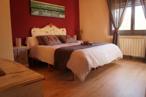 Ένα ή περισσότερα κρεβάτια σε δωμάτιο στο Apartamento con encanto L'Estany 1