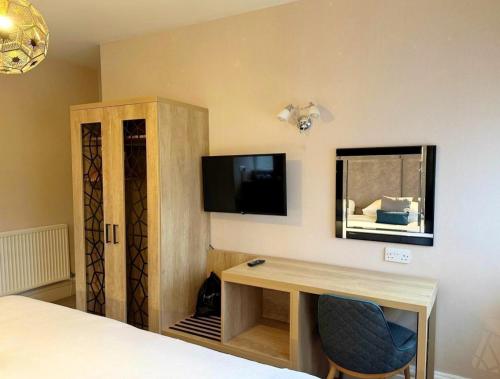 Caerwylan Hotelにあるテレビまたはエンターテインメントセンター
