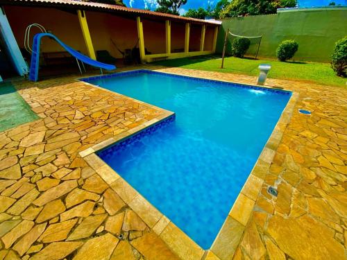Kolam renang di atau dekat dengan Chácara Roteiro do Vinho com Wi-Fi