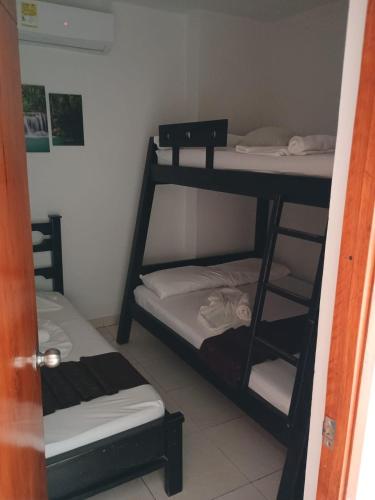 Krevet ili kreveti na sprat u jedinici u okviru objekta Hotel santana Doradal