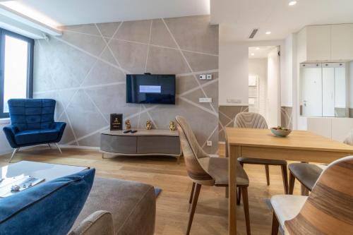 Χώρος καθιστικού στο Apartments Royal - Sakura Park