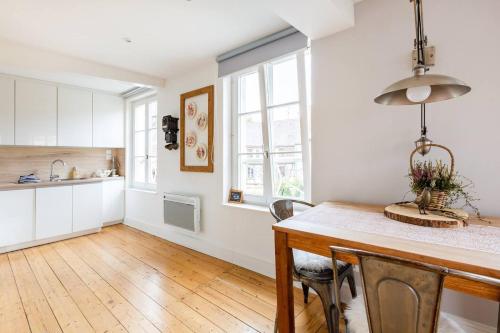 Η κουζίνα ή μικρή κουζίνα στο Reflets Sur La Lauch appartements