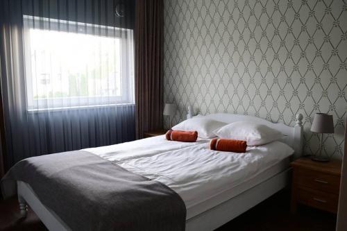 Llit o llits en una habitació de Rohu apartment