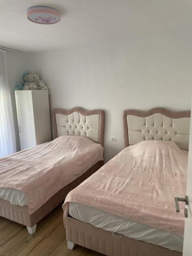 Postel nebo postele na pokoji v ubytování Icon Apartment