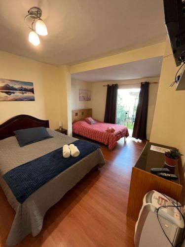 Ένα ή περισσότερα κρεβάτια σε δωμάτιο στο Uli´s house