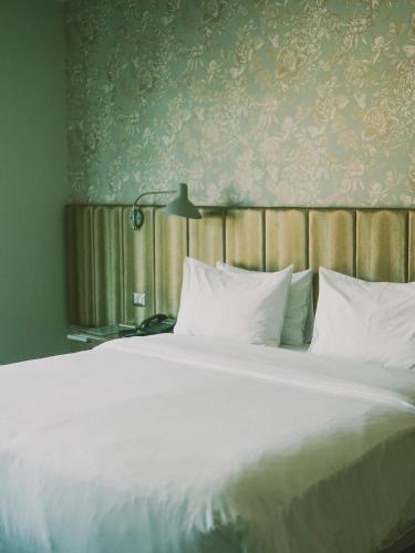 Postel nebo postele na pokoji v ubytování Hotel Eco Boutique Bidasoa