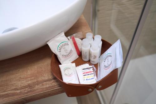 a small table withentedented products on a table at Toto e Peppino Luxury Rooms in Naples