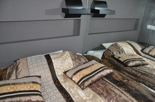 Cama o camas de una habitación en Apartament Mokotow